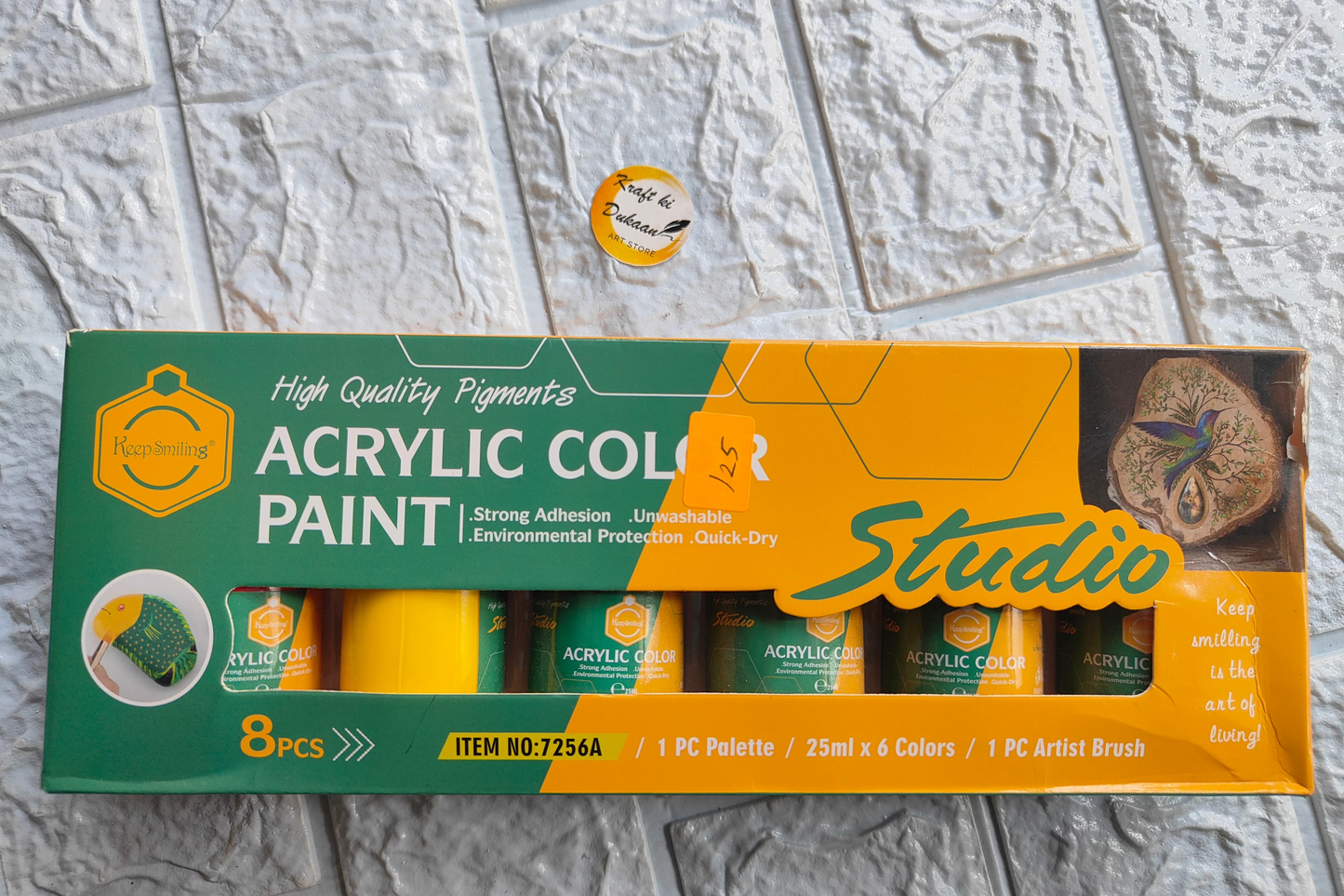 Beginner acrylic paint kit featuring 8 vibrant colors, palette, and brush for artistic projects
